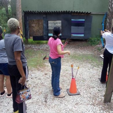 Foster kids enjoying archery during and outing with The Halo Project.